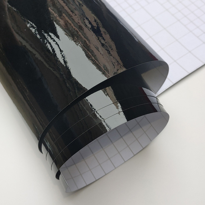 Εξαιρετικά γυαλιστερό πιάνο μαύρο περιτύλιγμα αυτοκινήτου Αυτοκόλλητα αυτοκόλλητα αυτοκόλλητα αυτοκόλλητα αυτοκόλλητα με φούσκα για φορητό υπολογιστή