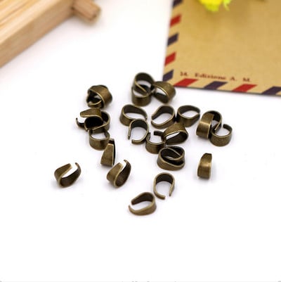 100 vnt. 6x5/9x6/11x6 mm metaliniai pakabukų segtukai, užsegimo segtukai.