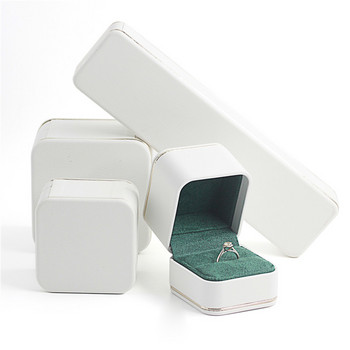 Πολυτελές PU δερμάτινο σκουλαρίκι κρεμαστό κουτί συσκευασίας Δαχτυλίδι γαμήλιου κοσμήματος Θήκη αποθήκευσης δώρου με χρυσές γραμμές