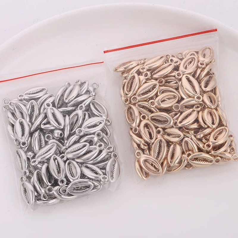50db/tétel Tengeri kagylóbűvek Bohemian Cowrie kagylóhéjak 10x18mm-es CCB gyöngyök medálok barkácsoláshoz nyaklánc karkötő ékszerkészítéshez