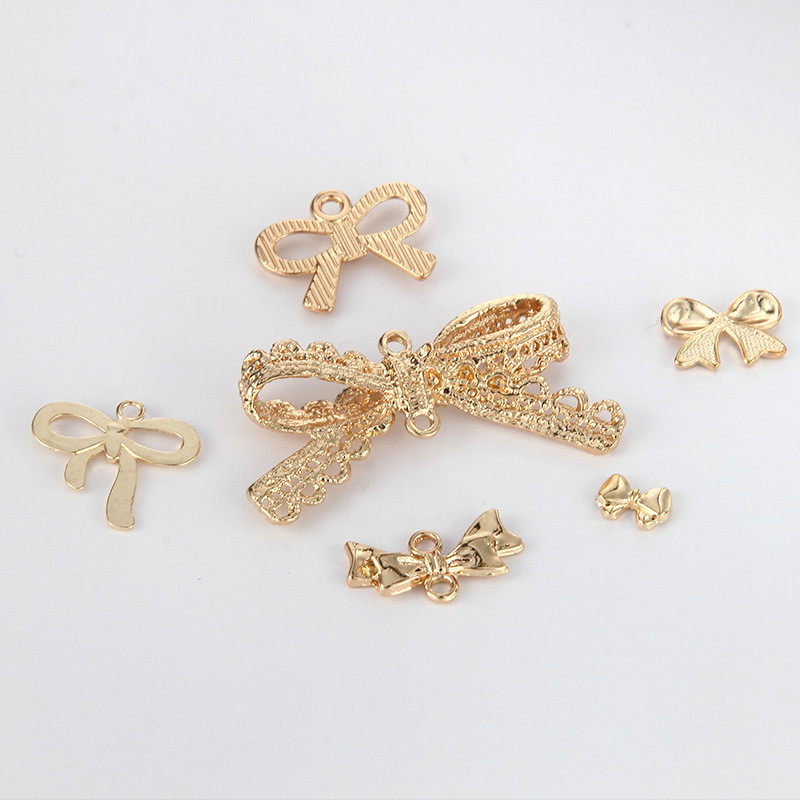 10 komada mašna s čvorovima privjesaka KC pozlaćeni modni privjesci za DIY izradu nakita Ogrlica Narukvica Naušnice Dodaci za rukotvorine