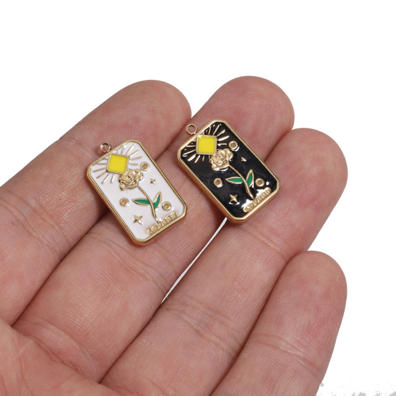 4 gab. Nerūsējošā tērauda gleznas emaljas saules ziedu kuloni sievietēm kaklarota balta melna piekariņi DIY auskari rotaslietas atradumi