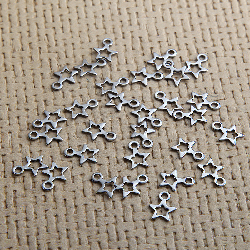 Visokokvalitetni zvjezdani privjesak od nehrđajućeg čelika za žene Narukvica Izrada nakita Metalni šuplji ručno izrađeni privjesci 40 kom./lot