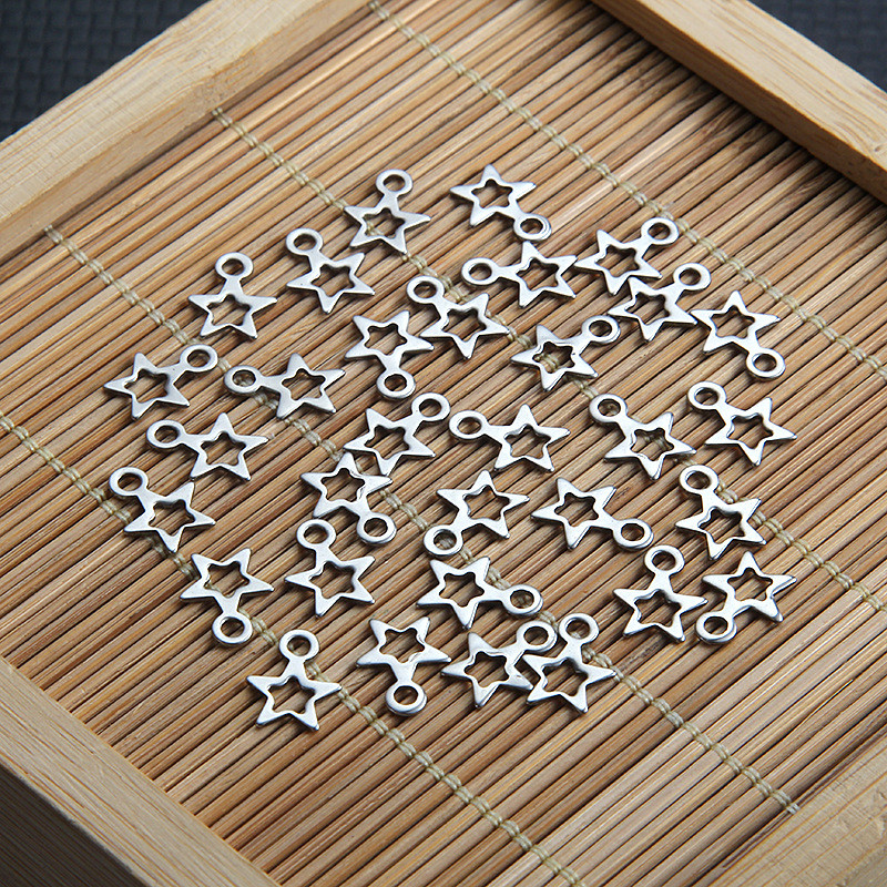 Visokokvalitetni zvjezdani privjesak od nehrđajućeg čelika za žene Narukvica Izrada nakita Metalni šuplji ručno izrađeni privjesci 40 kom./lot