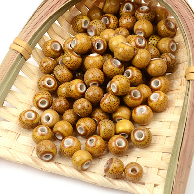 6 mm-es 8 mm-es 10 mm-es divatos kerámia gyöngyök 2,5 mm-es nagy lyukú barkácsolás kézzel készített laza kerek porcelán gyöngyök ékszerkészítéshez