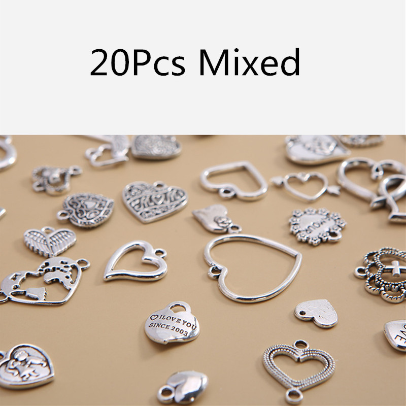 20 db/tétel Vegyes vintage fém szív alakú varázslatok gyöngyök barkácsolás karkötő medál nyaklánc kiegészítők ékszerekhez.