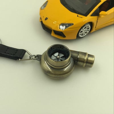 Turbo atslēgu piekariņš ar reālu skaņu cinka sakausējuma turbo atslēgu piekariņš ar skaņas uzmavas gultni, griežams atslēgu piekariņš auto piederumiem S662