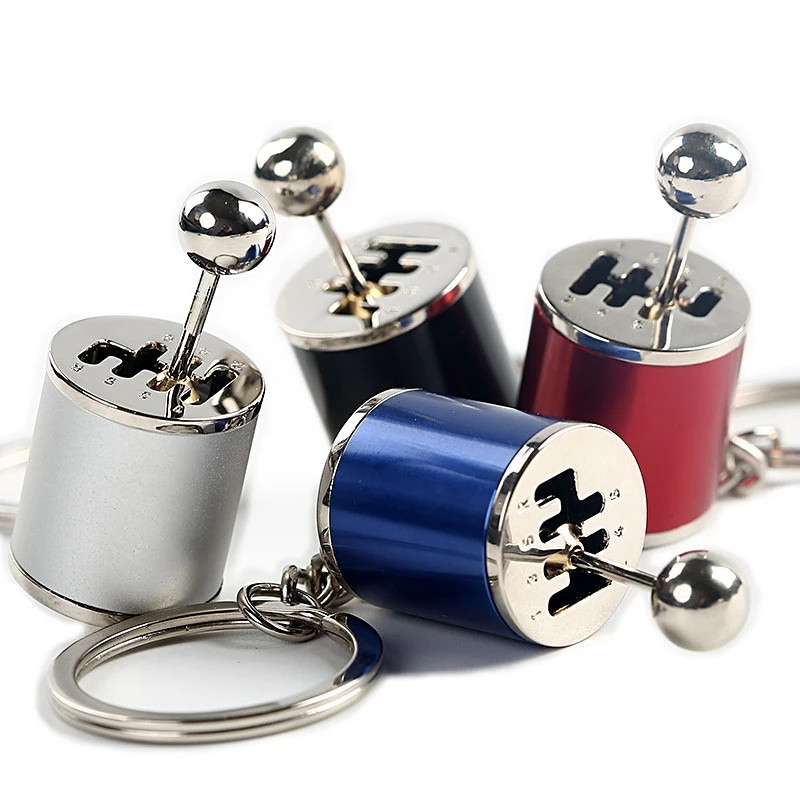 Automobilio mechaninės pavarų dėžės svirtis, metalinė pavarų dėžė, raktų pakabukas, pavarų dėžė
