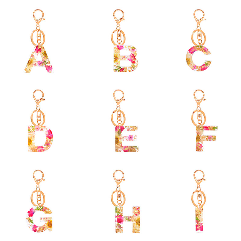 1 buc. Breloc cu litere din flori uscate, cu alfabet din cristal, rășină