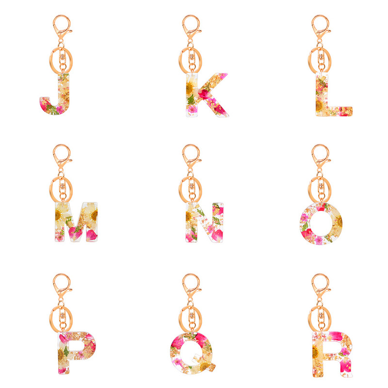 1 buc. Breloc cu litere din flori uscate, cu alfabet din cristal, rășină