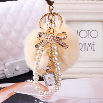 2022 Fashion Pearl Chain Crystal Bottle Bow Pompom Μπρελόκ αυτοκινήτου Γυναικεία Τσάντα χειρός Δαχτυλίδι μπρελόκ Αφράτο μπρελόκ μπρελόκ Κοσμήματα