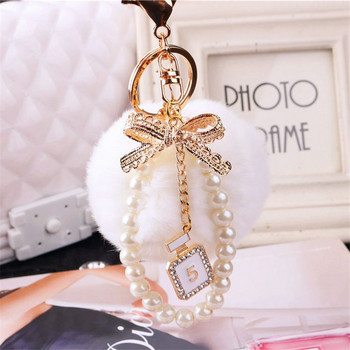 2022 Fashion Pearl Chain Crystal Bottle Bow Pompom Μπρελόκ αυτοκινήτου Γυναικεία Τσάντα χειρός Δαχτυλίδι μπρελόκ Αφράτο μπρελόκ μπρελόκ Κοσμήματα