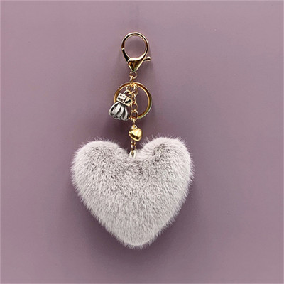 Breloc cu pompon în formă de inimă cu ciucuri de modă