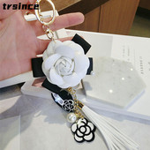 Vznešená a elegantná perlová kamélia kľúčenka s kvetinovým príveskom, kľúčenka s mašľou, ručne vyrobená dámska kabelka, prívesok, dekorácia