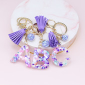 Brelocuri cu ciucuri de modă Bijuterii pentru femei Litere AZ Pandantiv inițial pentru geantă din rășină Breloc drăguț Breloc Accesorii