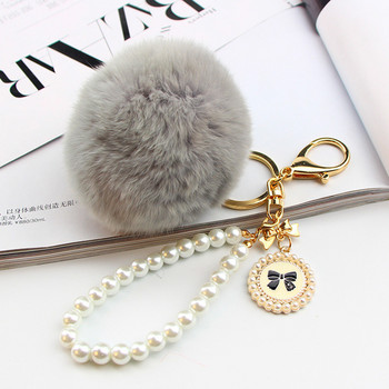 2022 Fashion Pearl Chain Crystal Bottle Bow Pompom Μπρελόκ αυτοκινήτου Γυναικεία Τσάντα χειρός Δαχτυλίδι μπρελόκ Αφράτο μπρελόκ μπρελόκ Κοσμήματα