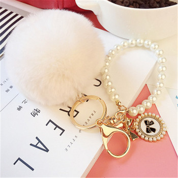 2022 Fashion Pearl Chain Crystal Bottle Bow Pompom Μπρελόκ αυτοκινήτου Γυναικεία Τσάντα χειρός Δαχτυλίδι μπρελόκ Αφράτο μπρελόκ μπρελόκ Κοσμήματα