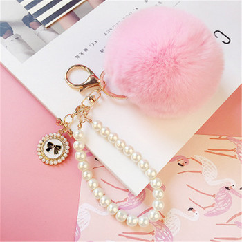 2022 Fashion Pearl Chain Crystal Bottle Bow Pompom Μπρελόκ αυτοκινήτου Γυναικεία Τσάντα χειρός Δαχτυλίδι μπρελόκ Αφράτο μπρελόκ μπρελόκ Κοσμήματα