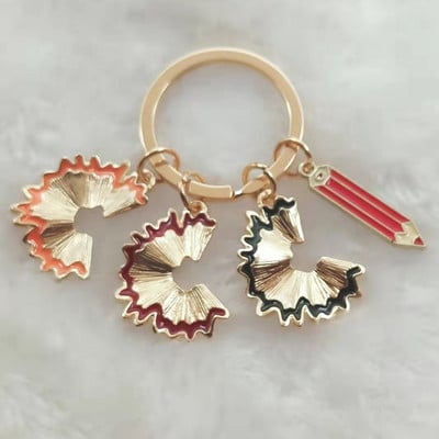 Nová módna zliatina smaltovaná kľúčenka pre učiteľov a študentov s ceruzkou, nepravidelná geometrická ceruzka, hobliny, šperky, vtipná punková kľúčenka