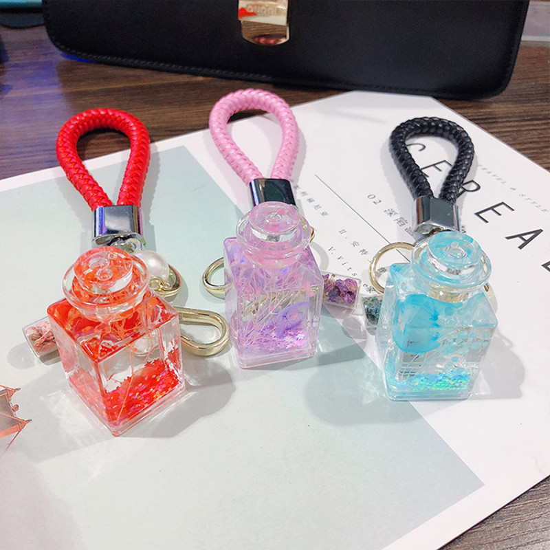 Creativ nemuritor floare cu nisip mișcător sticlă în derivă breloc femeie drăguț sticlă de parfum floare trandafir lichid plutitor breloc geanta cadou