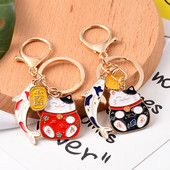 Akciós 1 db Japán Anime Lucky Cat Fortune kulcstartó kulcstartó autó női táska függőbűbáj 2021