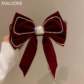 XIALUOKE Gyönyörű Bowknot Crystal Hajtűk Fejfedők Női Vintage Hyperbole Hajkapcsok Esküvői Haj Ékszer Ajándékok