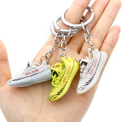 Új mini tornacipő kulcstartó ajándék 3D cipő modell táskák hátizsákok dekoratív díszek autóajtó kulcstartó ajándék barátnak