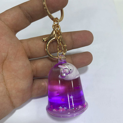 Kreativni šareni plutajući zec privjesak za ključeve Slatki pokretni tekući privjesci za ključeve u 4 stila Ženska automobilska torba Privjesak Gadgeti Igračke Poklon