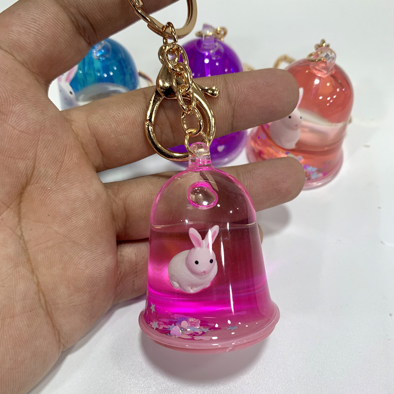 Kreativni šareni plutajući zec privjesak za ključeve Slatki pokretni tekući privjesci za ključeve u 4 stila Ženska automobilska torba Privjesak Gadgeti Igračke Poklon