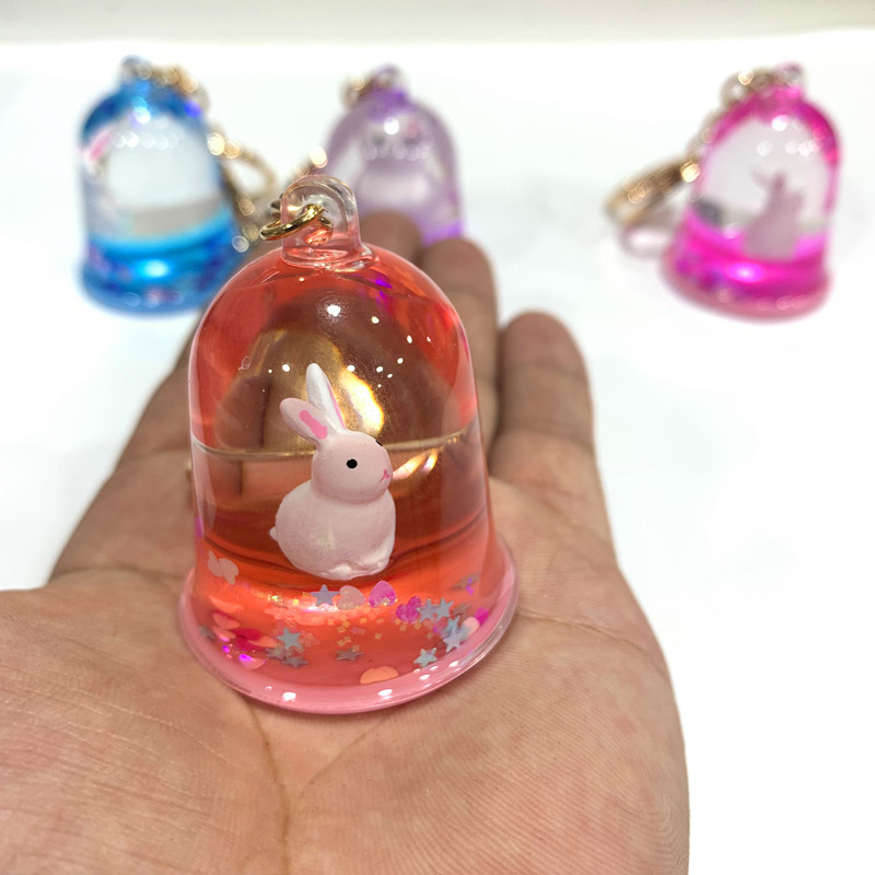 Kreativni šareni plutajući zec privjesak za ključeve Slatki pokretni tekući privjesci za ključeve u 4 stila Ženska automobilska torba Privjesak Gadgeti Igračke Poklon