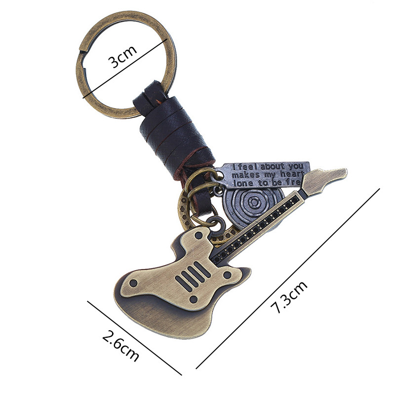 Vintage privjesak za ključeve od brončane legure gitare Hip hop rock stil Muškarci Žene Ruksak Privjesak za ključeve Privjesak Privjesak za ključeve Modni nakit