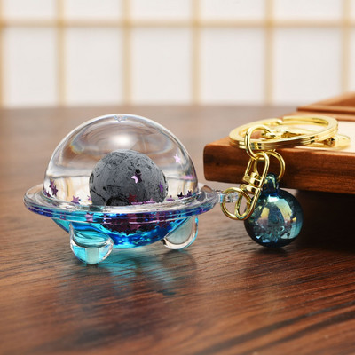 Astronaut creativ Oild farfurioară zburătoare Breloc lichid Desene animat Planetă plutitoare Rachetă Nisipuri mișcătoare Breloc cuplu Geanta Cadou Pandantiv