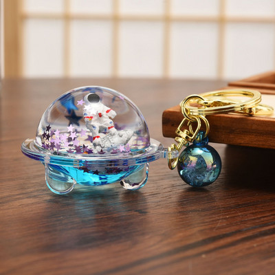 Astronaut creativ Oild farfurioară zburătoare Breloc lichid Desene animat Planetă plutitoare Rachetă Nisipuri mișcătoare Breloc cuplu Geanta Cadou Pandantiv