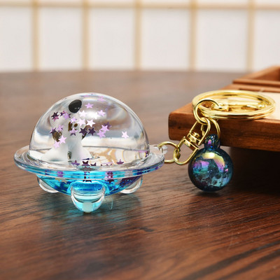 Astronaut creativ Oild farfurioară zburătoare Breloc lichid Desene animat Planetă plutitoare Rachetă Nisipuri mișcătoare Breloc cuplu Geanta Cadou Pandantiv