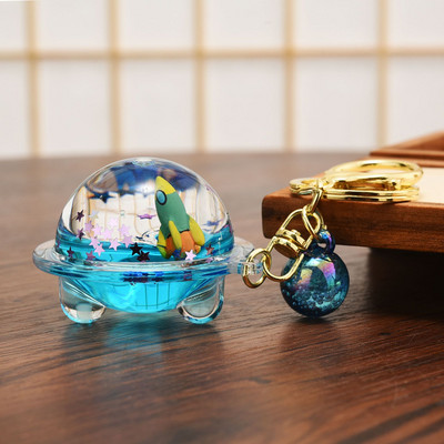 Astronaut creativ Oild farfurioară zburătoare Breloc lichid Desene animat Planetă plutitoare Rachetă Nisipuri mișcătoare Breloc cuplu Geanta Cadou Pandantiv