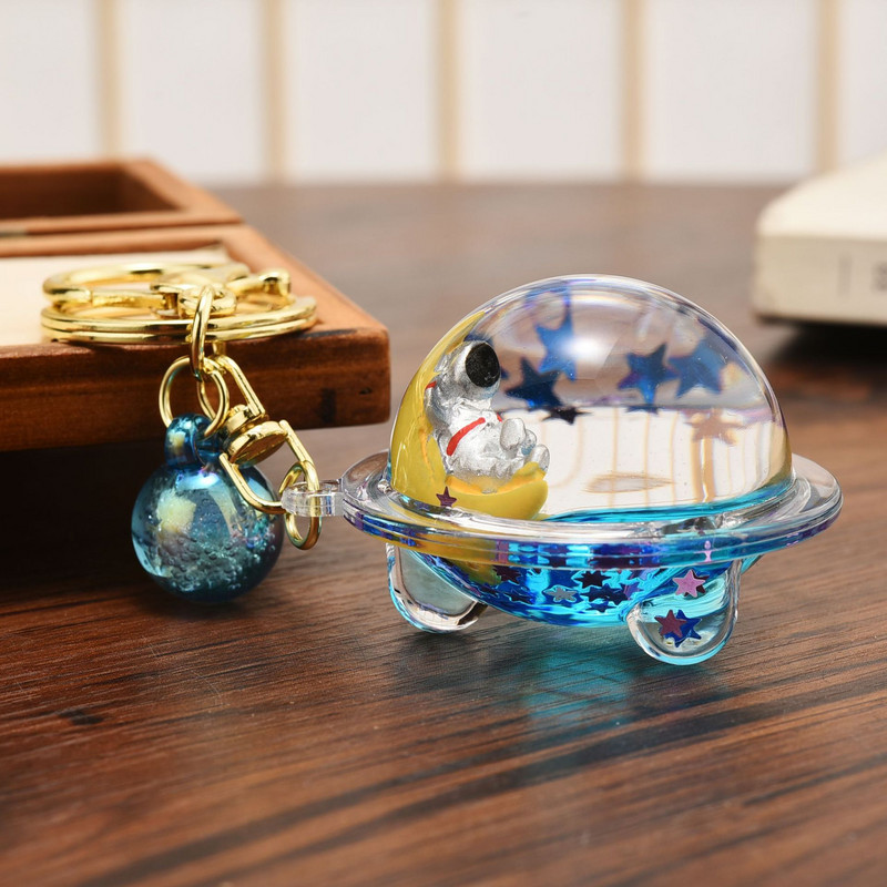 Astronaut creativ Oild farfurioară zburătoare Breloc lichid Desene animat Planetă plutitoare Rachetă Nisipuri mișcătoare Breloc cuplu Geanta Cadou Pandantiv