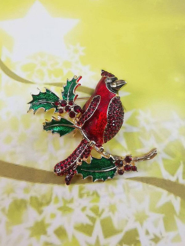 2022 m. Nauja Kalėdų serija Šventinių dovanų emaliu nudažyta raudonai miela ir įdomi Laimės paukščio sagė