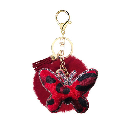 Breloc creativ mic cadou flanel cu imprimeu leopard cu strass, formă unică de fluture în formă de inimă, pandantiv cu bile de păr cu pompon de 8 cm