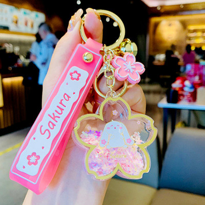 Breloc cu nisipuri mișcătoare din metal acrilic, drăguț, cu flori de cireș, cadou mic creativ, telefon mobil, ghiozdan, remorcă pentru mașină.