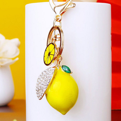 Νέο χαριτωμένο Rhinestone Simulation Fruit Small Lemon Keychain Cartoon Γυναικεία τσάντα αυτοκινήτου Δαχτυλίδι μπρελόκ K5121