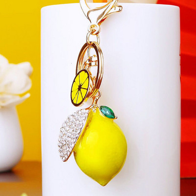 Νέο χαριτωμένο Rhinestone Simulation Fruit Small Lemon Keychain Cartoon Γυναικεία τσάντα αυτοκινήτου Δαχτυλίδι μπρελόκ K5121