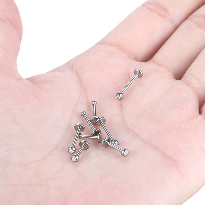 1 DB Titanium CZ ajakgyűrű Stud Helix Piercing Oreja belső szál drágakő fülporc Tragus piercingek Daith fülbevaló stud 16G