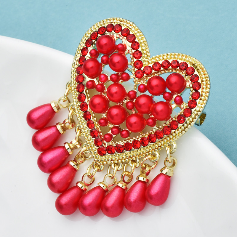 Wuli&baby Pearl Heart Bojt brossok Női 2 színű Retro Design Love Party Alkalmi irodai bross Ajándékok