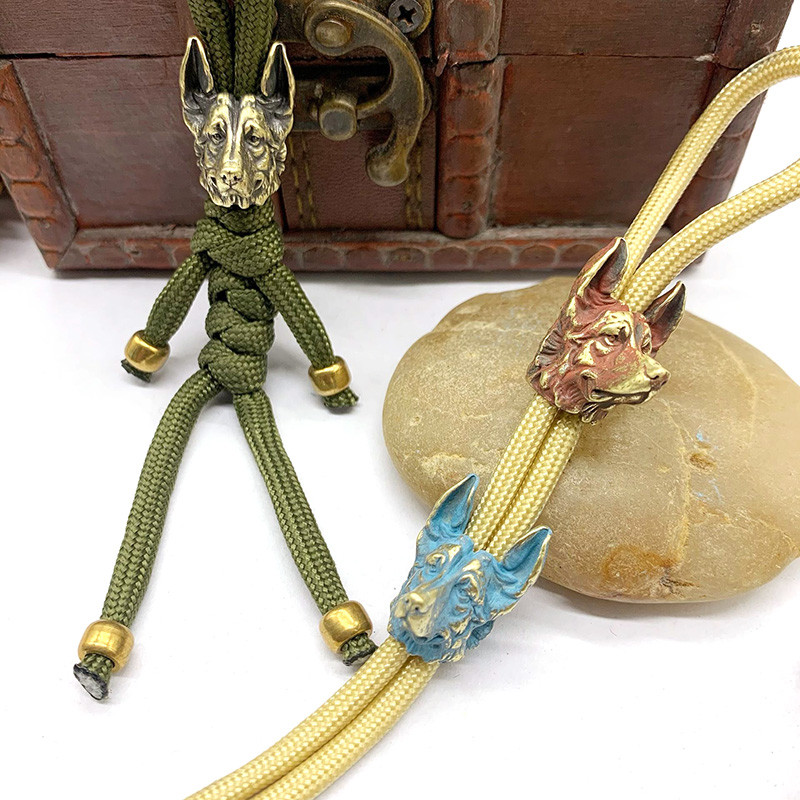 Câine ciobănesc Cuțit din alamă margele șnur pandantiv bijuterii instrument EDC în aer liber Accesorii creative bricolaj umbrelă funie agățat manual