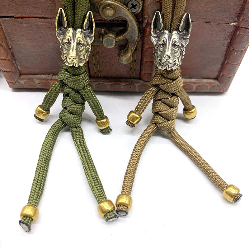 Câine ciobănesc Cuțit din alamă margele șnur pandantiv bijuterii instrument EDC în aer liber Accesorii creative bricolaj umbrelă funie agățat manual