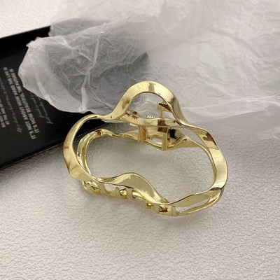 Versiune coreeană Metal Geometric Ac de păr Bowknot Hollow Grab Clip de păr Duckbill Clip Femei Accesorii de păr