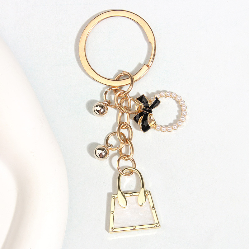 Drăguț Breloc Perle Bowknot Fusta Inimă Geantă Breloc Rochie Lanțuri cheie emailate Cadouri de prietenie Pentru Femei Fete Bijuterii DIY