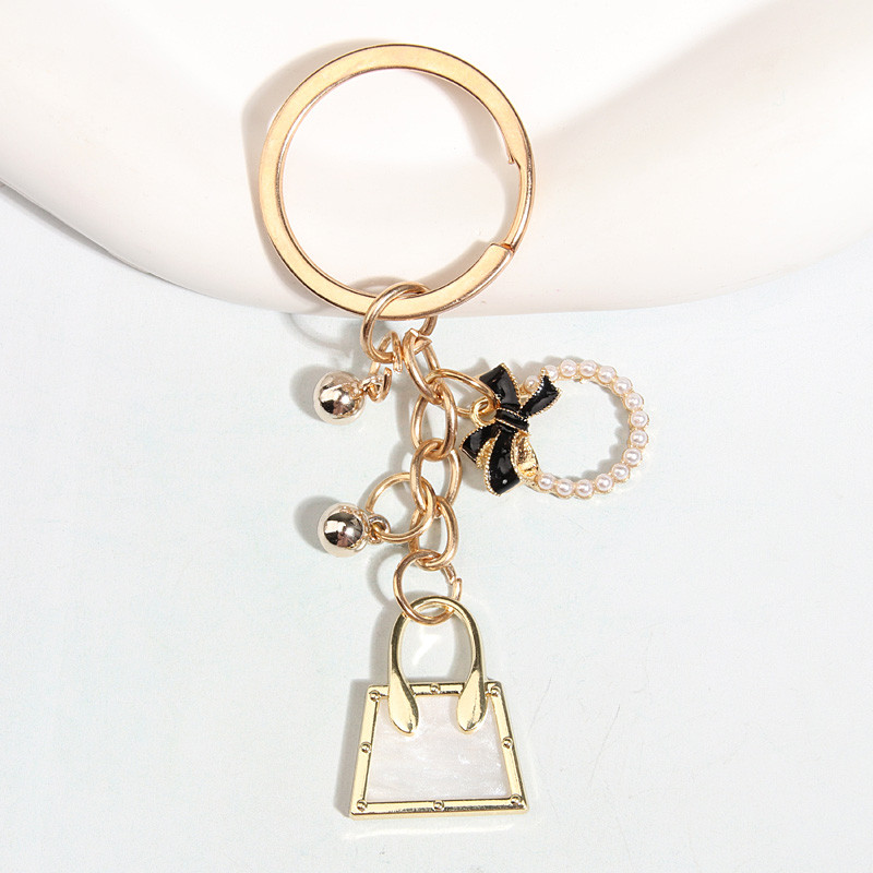 Drăguț Breloc Perle Bowknot Fusta Inimă Geantă Breloc Rochie Lanțuri cheie emailate Cadouri de prietenie Pentru Femei Fete Bijuterii DIY