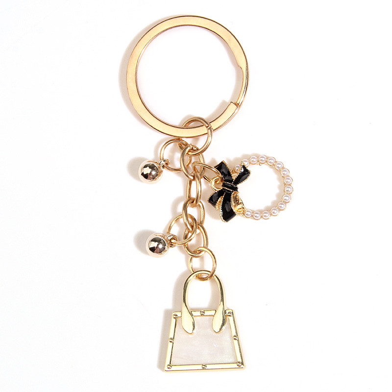 Drăguț Breloc Perle Bowknot Fusta Inimă Geantă Breloc Rochie Lanțuri cheie emailate Cadouri de prietenie Pentru Femei Fete Bijuterii DIY