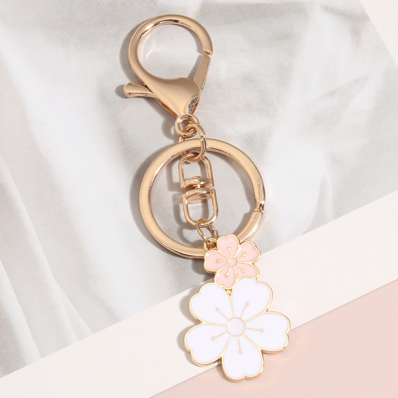 Breloc drăguț cu flori de Sakura Breloc emailat pentru femei, fete, accesoriu pentru geantă, pentru agățat mașină, cadou de bijuterii lucrate manual